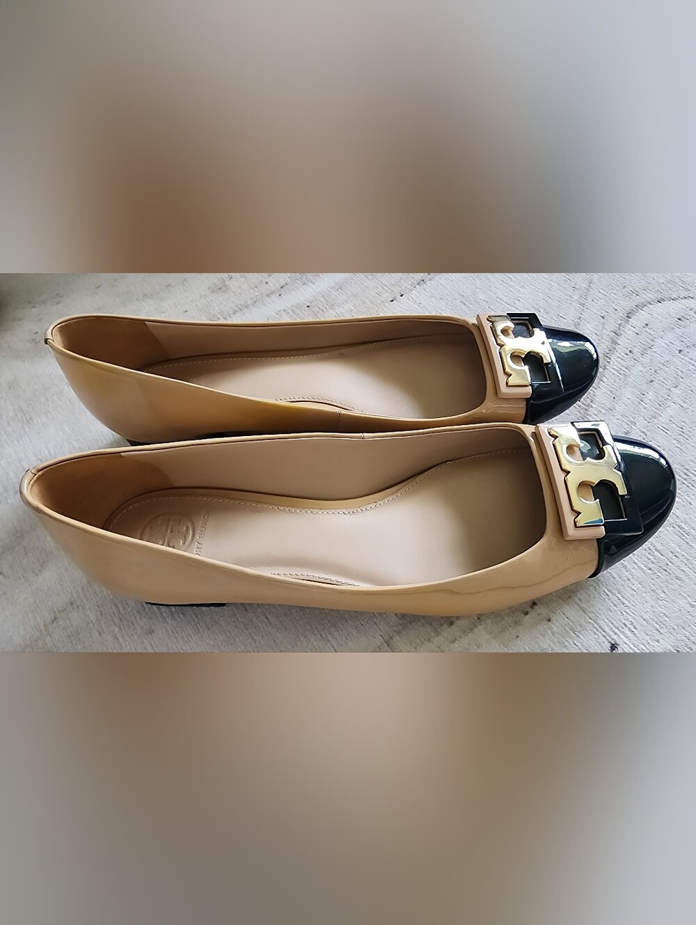 Two-Tone Beige and Black Cap-Toe Ballet Flats with Gold Accent